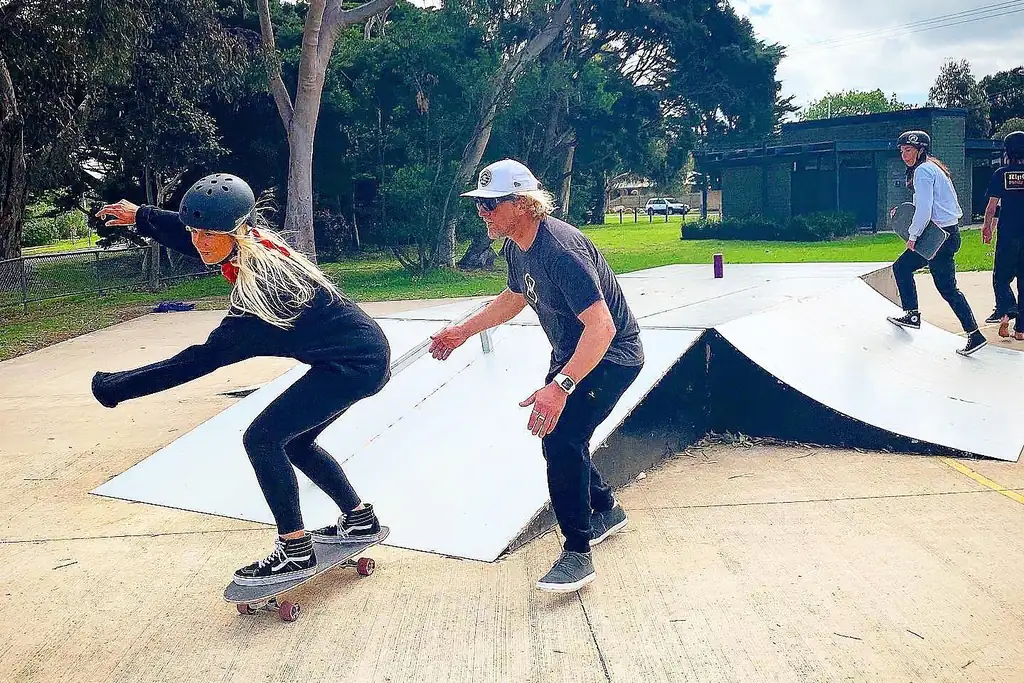 A Pro Surf Coaching student training on a SmoothStar skateboard