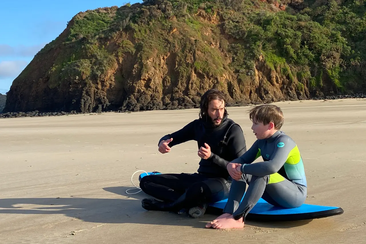 Pro Surf Coaching students heading into the water at Smiths Beach