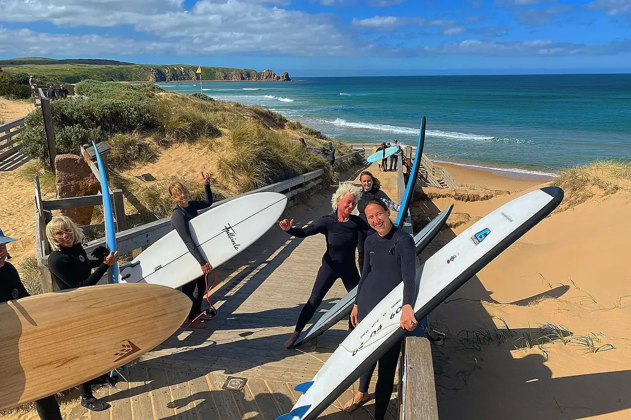 Women at a Pro Surf Coaching ladies surf club session