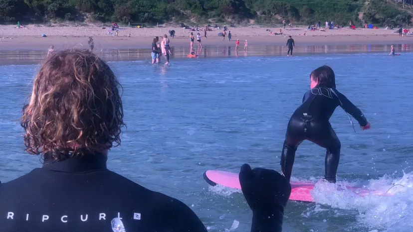 Surfers in the water at Smiths Beach