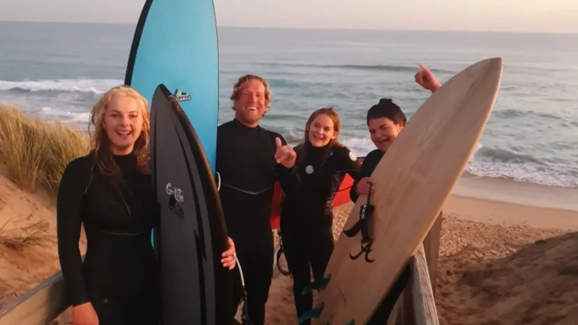 The Pro Surf Coaching ladies surf club in the water